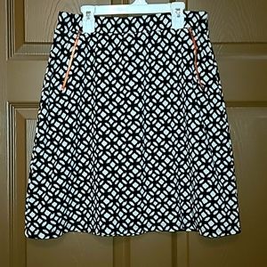 Black and patterned skirt